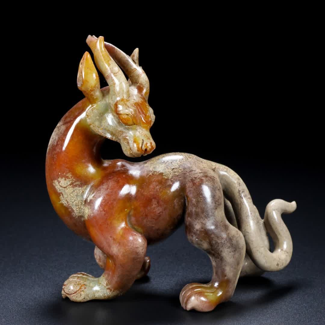 A Han Dynasty jade beast: Han Dynasty jade beast SIZE: L:13.5cm W:6cm H:13cm W:498g (The Dimensions Of All Batches Are Manually Measured.If You Need More Detailed Information, Please Contact Our Customer Service Before