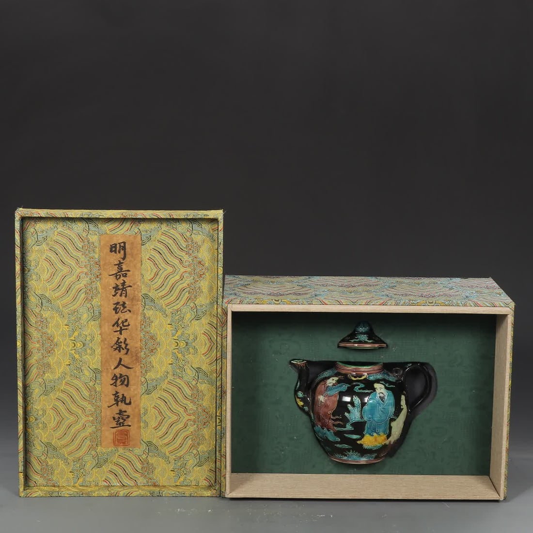A Ming Dynasty Jiajing enamel colorful figure holding a pot: Ming Dynasty Jiajing enamel colorful figure holding the pot SIZE: H: 16.5cm MouthD: 6cm Belly diameter 13cm (The Dimensions Of All Batches Are Manually Measured.If You Need More Detailed Information, 