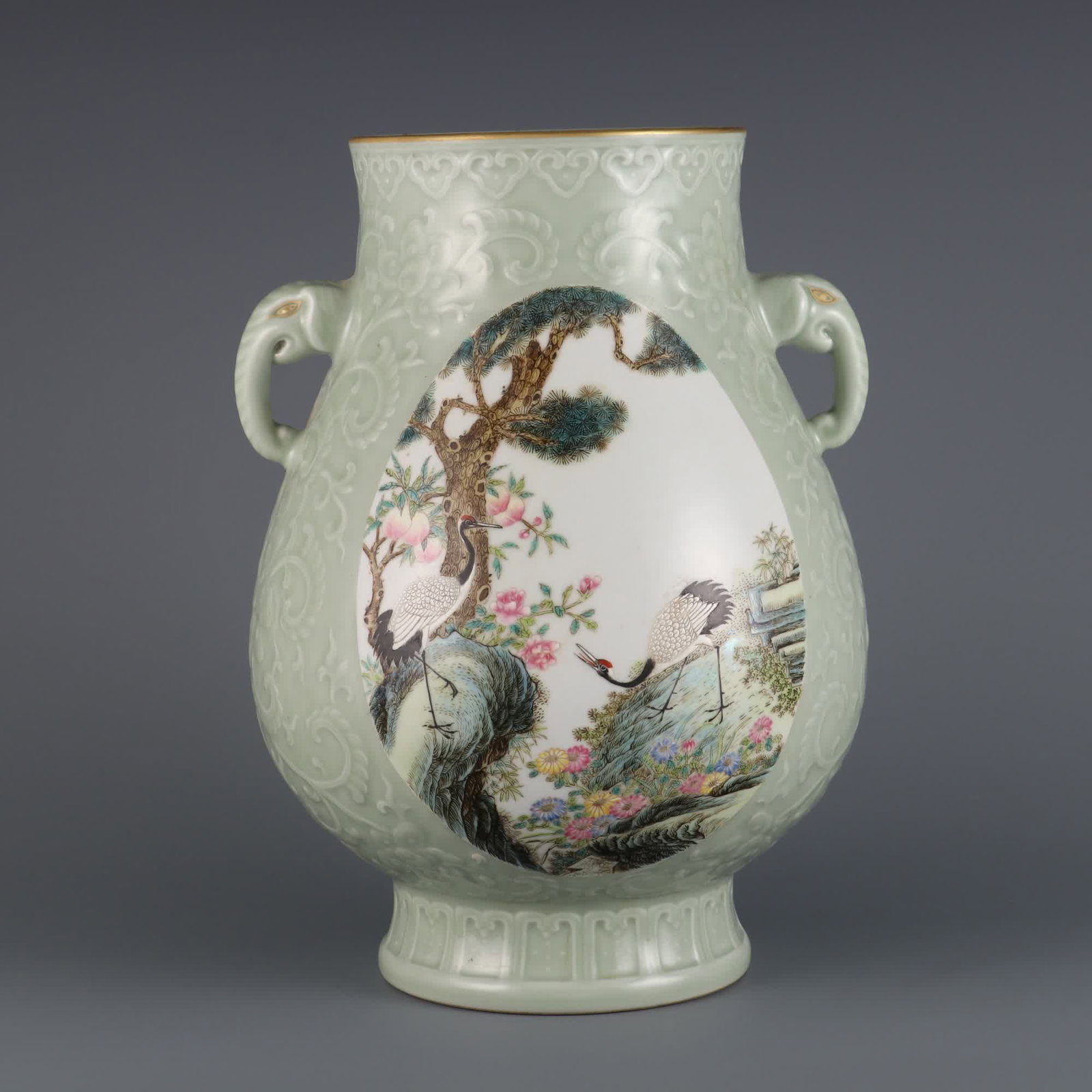 A piece of Qing Dynasty Qianlong year bean celadon carved entwined lotus consecrated pastel pine: Qing Dynasty Qianlong year bean celadon carved entwined lotus consecrated pastel pine crane longevity elephant ear zun SIZE: H:30cm MouthD:13.5cm (The Dimensions Of All Batches Are Manually Measured.I