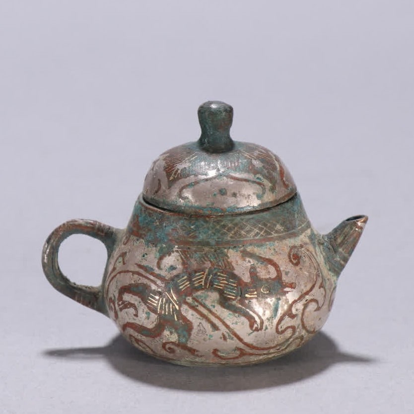 A Han Dynasty copper gold and silver beast pattern pot (1 of 9)