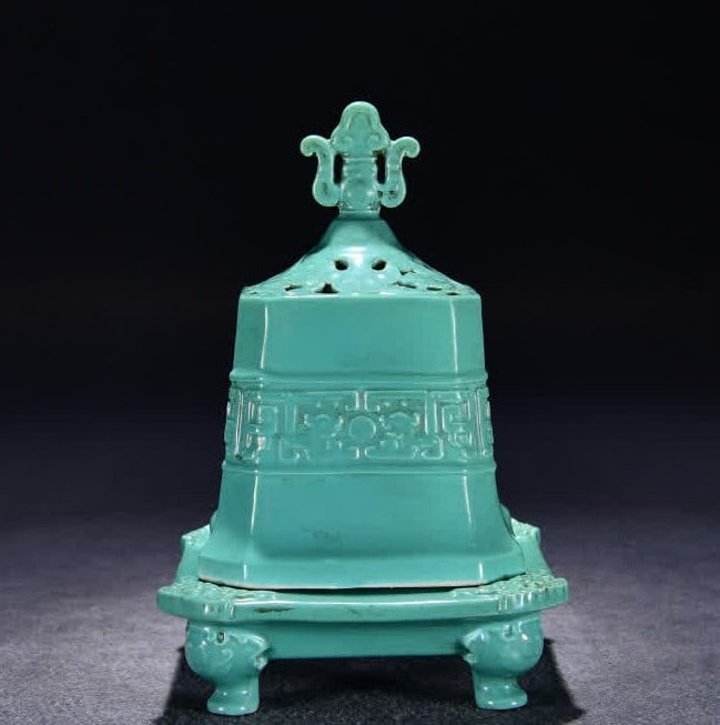 A Qing Dynasty Qianlong green glaze carved back phoenix pattern square smoker (1 of 10)