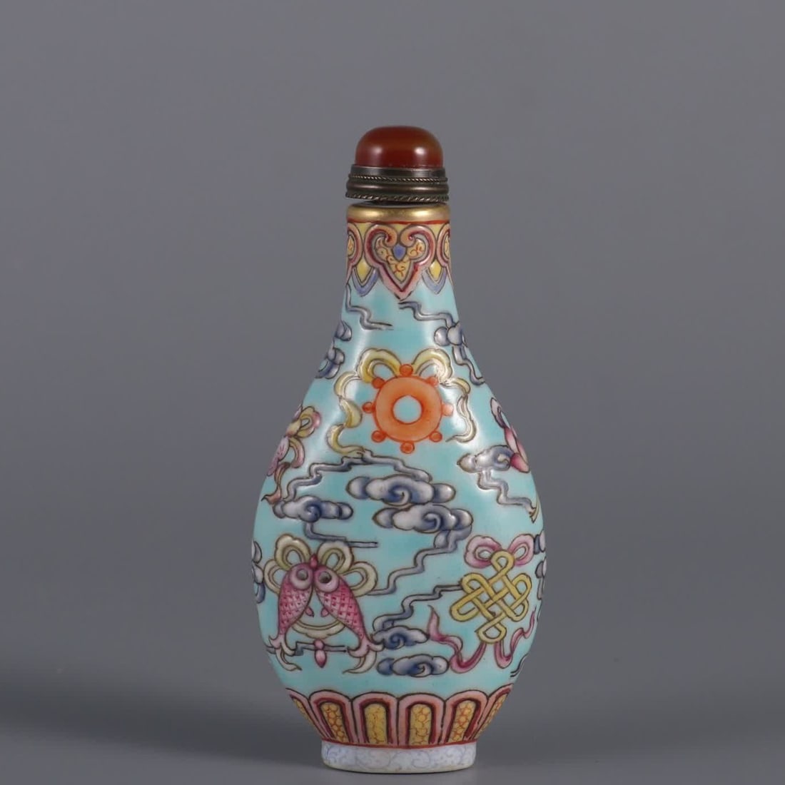 A Qing Dynasty Qianlong year green pastel eight treasure pattern snuff bottle (1 of 8)