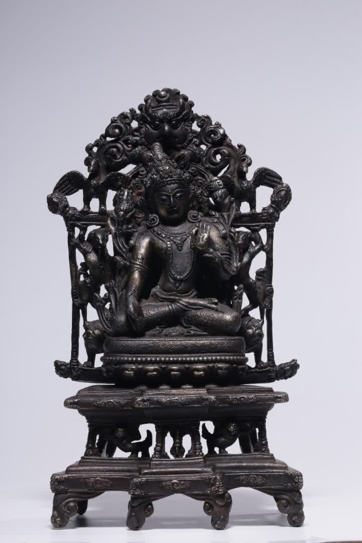 A bronze lacquered gold Tara backlit seated statue from the Yuan and Ming dynasties (1 of 9)