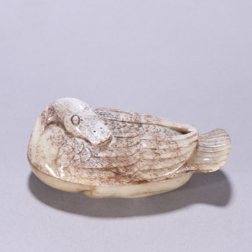 A Ming Dynasty fire-burned jade goose lid box (1 of 9)