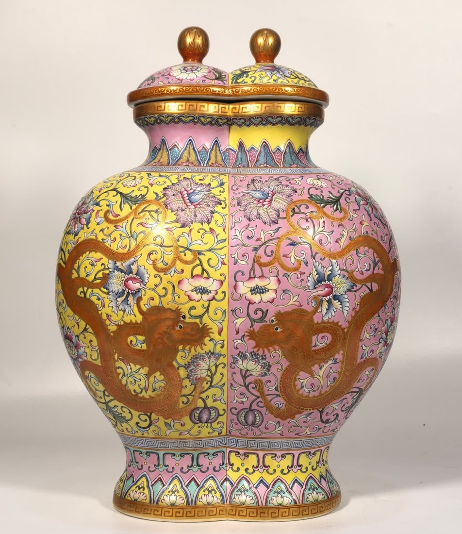 A piece of Qing Dynasty Qianlong enamel color entwined lotus flower double dragon gilded twin cover: Qing Dynasty Qianlong enamel color entwined lotus flower double dragon gold-painted twin cover irrigation SIZE: H:39cm MouthD:15cm Belly diameter 26cm Foot diameter 17.5cm (The Dimensions Of All Batch