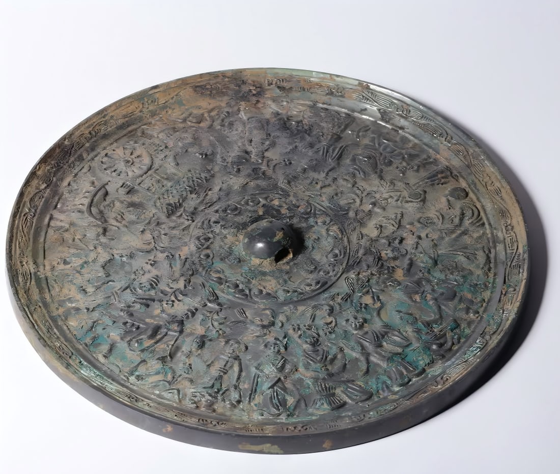 A Han Dynasty bronze character story mirror (1 of 7)