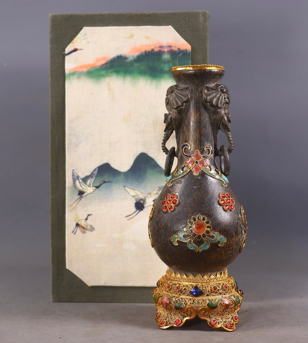 An Exquisite Gilt Bronze Inlaid Gems Double-Ears Vase: An Exquisite Gilt Bronze Inlaid Gems Double-Ears Vase Qing Dynasty, China Qianlong Four-character Mark Size:22.5cmx8.5cm Weight:675g (The Dimensions Of All Batches Are Manually Measured.If You Need