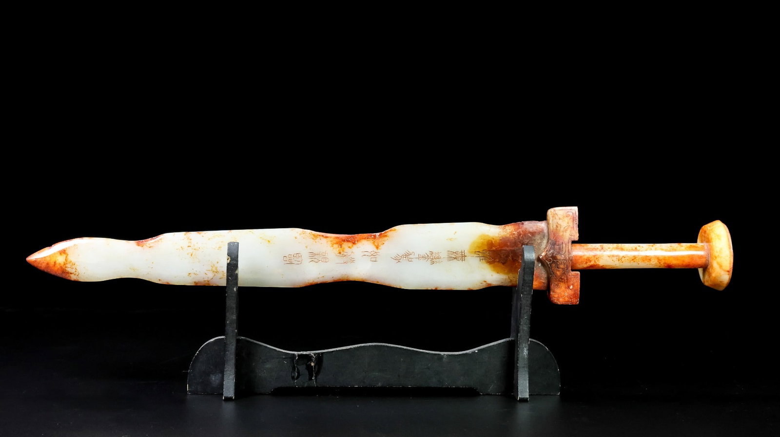 An Exquisite White Jade Sword Ornament: An Exquisite White Jade Sword Ornament Han Dynasty, China Size:51.9cmx7.5cmx5.7cm Weight:508g (The Dimensions Of All Batches Are Manually Measured.If You Need More Detailed Information, Please Contact