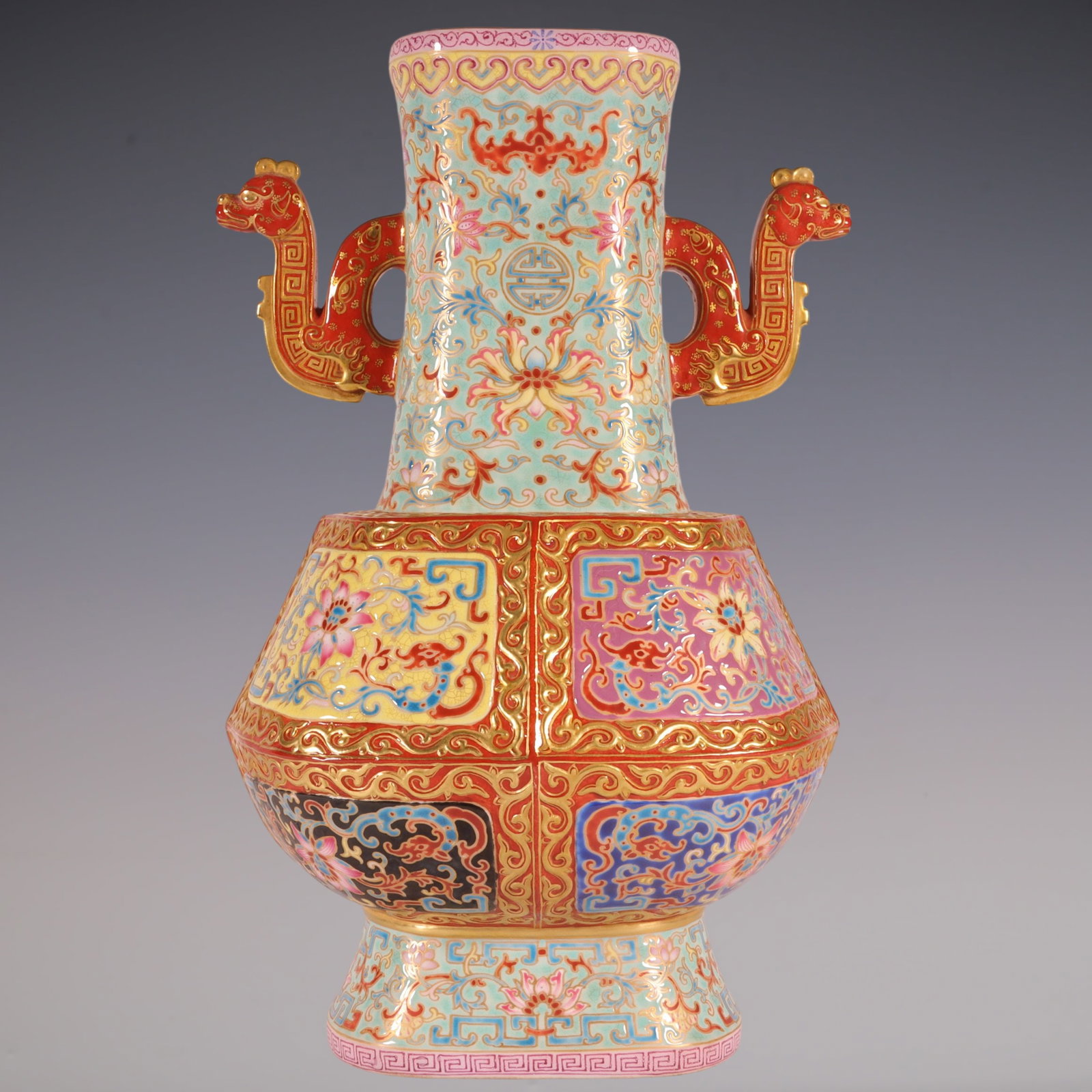 An Exquisite Enamel Green Ground Painted Gold Lotus Pattern Bats and Peach Pattern Double-Ears Vase: An Exquisite Enamel Green Ground Painted Gold Lotus Pattern Bats and Peach Pattern Double-Ears Vase Qing Dynasty, China Qianlong Four-character Mark Size:27.8cmx17cm (The Dimensions Of All Batches Are