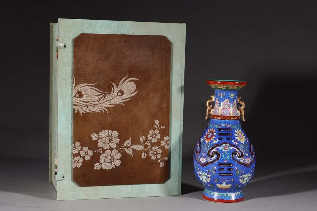 An Exquisite Enamel Lotus Pattern Double-Ears Vase: An Exquisite Enamel Lotus Pattern Double-Ears Vase Qing Dynasty, China Qianlong Six-character Mark Size:23cmx12cm (The Dimensions Of All Batches Are Manually Measured.If You Need More Detailed Informa