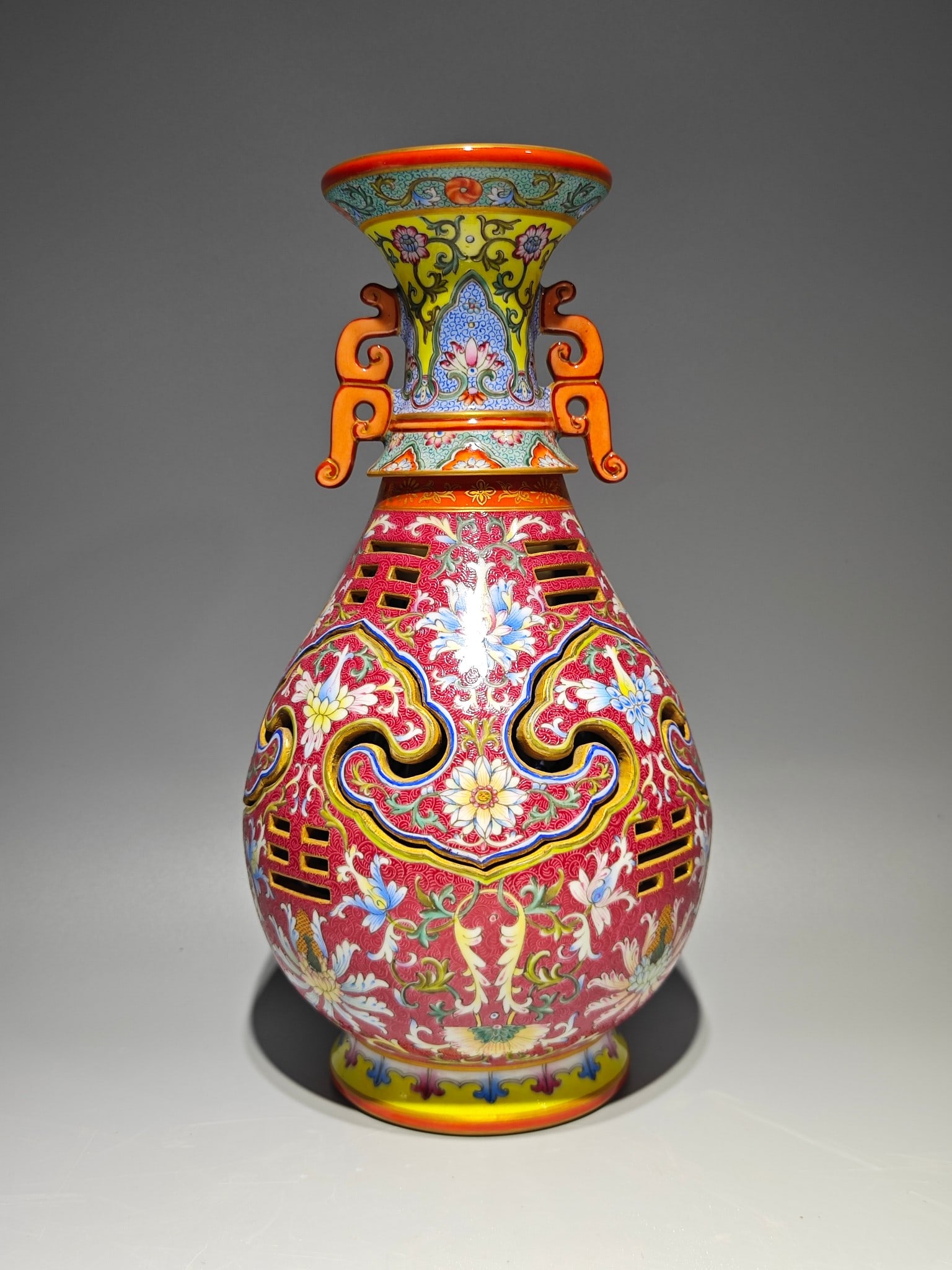 An Exquisite Enamel Ruby Red-Glazed Painted Gold Lotus Pattern Double-Ears Vase: An Exquisite Enamel Ruby Red-Glazed Painted Gold Lotus Pattern Double-Ears Vase Qing Dynasty, China Qianlong Six-character Mark Size:32cmx17.5cm (The Dimensions Of All Batches Are Manually