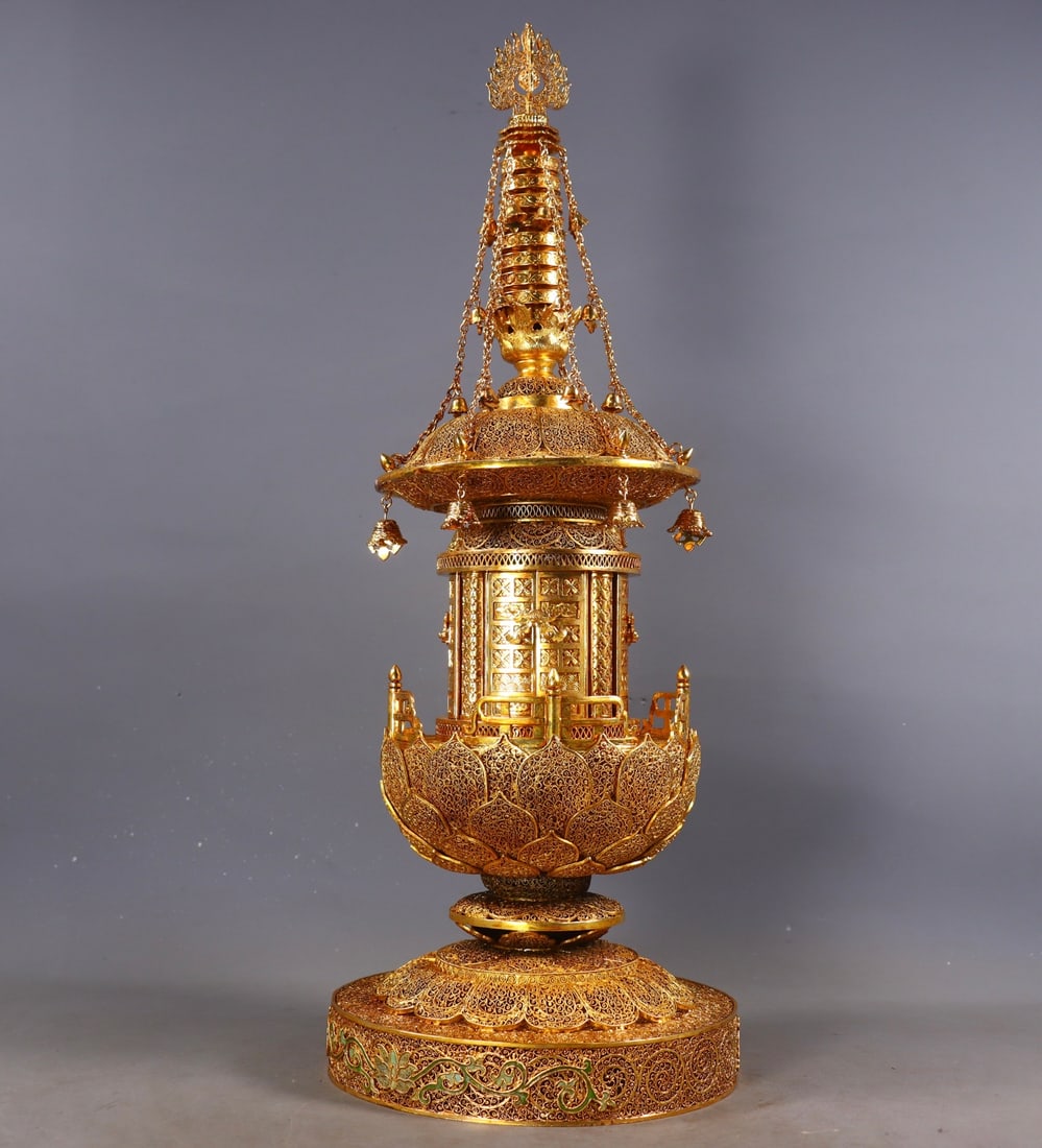An Exquisite Gilt Bronze Lotus Pattern Pagoda: An Exquisite Gilt Bronze Lotus Pattern Pagoda Qing Dynasty, China Qianlong Four-character Mark Size:47cmx18cm Weight:2290g (The Dimensions Of All Batches Are Manually Measured.If You Need More