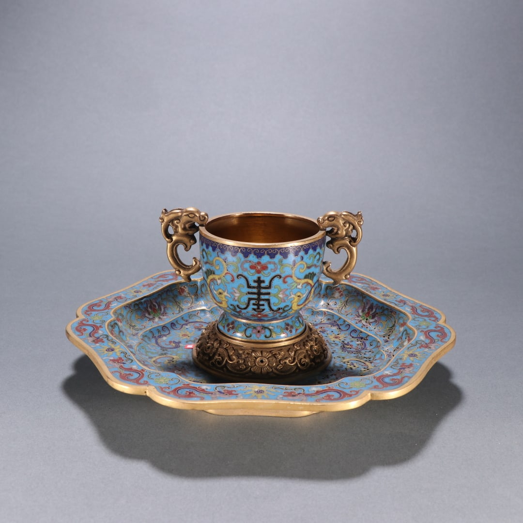 An Exquisite Cloisonne Dragon Pattern Lotus Pattern Double-Ears Libation Cup: An Exquisite Cloisonne Dragon Pattern Lotus Pattern Double-Ears Libation Cup Qing Dynasty, China Qianlong Four-character Mark Size:9cmx18.4cm Weight:795.3g (The Dimensions Of All Batches Are Manually