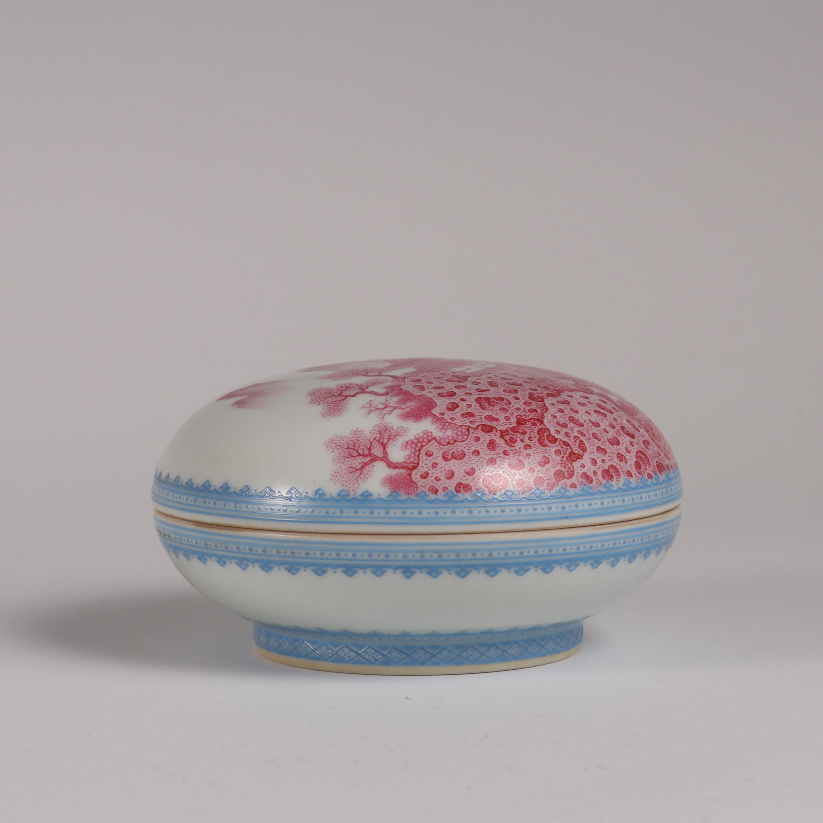 An Exquisite Ruby red-Glazed Landscape Pattern Box: An Exquisite Ruby red-Glazed Landscape Pattern Box Qing Dynasty, China Yongzheng Four-character Mark Size:5cmx9.3cm (The Dimensions Of All Batches Are Manually Measured.If You Need More Detailed