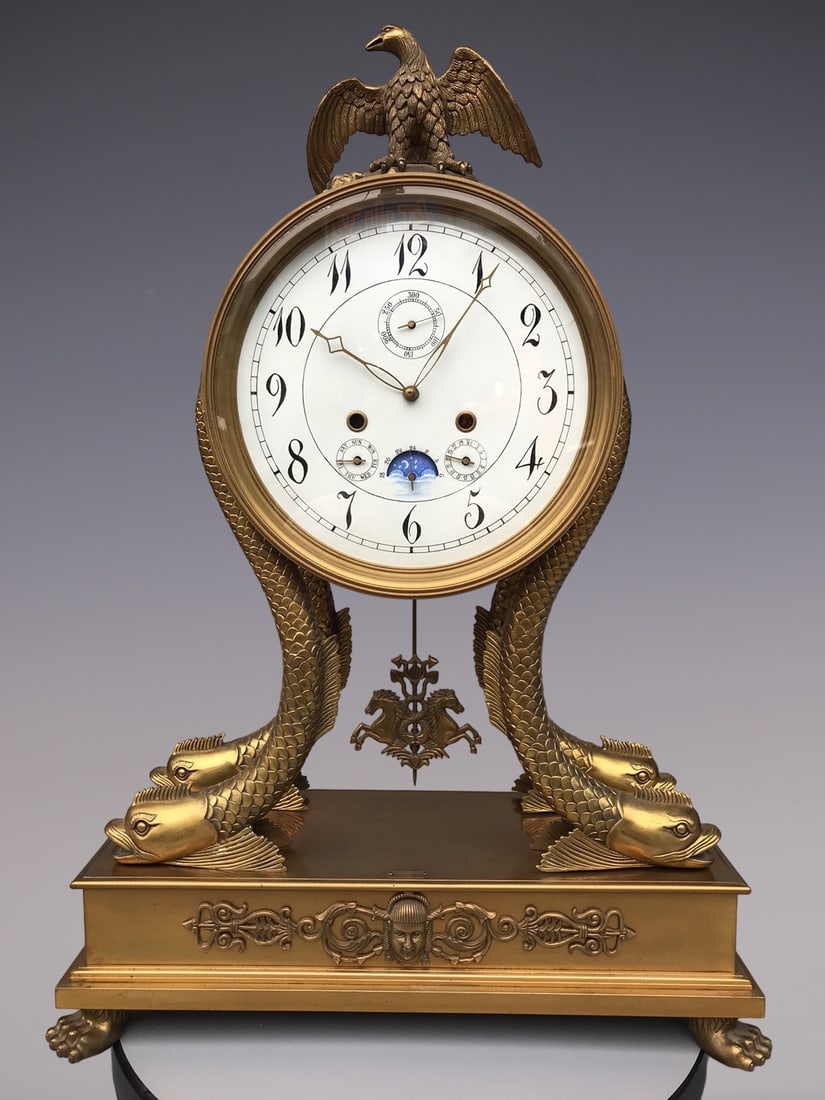 An Exquisite Bronze Clock: An Exquisite Bronze Clock Qing Dynasty, China Size:78cmx20cmx70cm (The Dimensions Of All Batches Are Manually Measured.If You Need More Detailed Information, Please Contact Our Customer Service