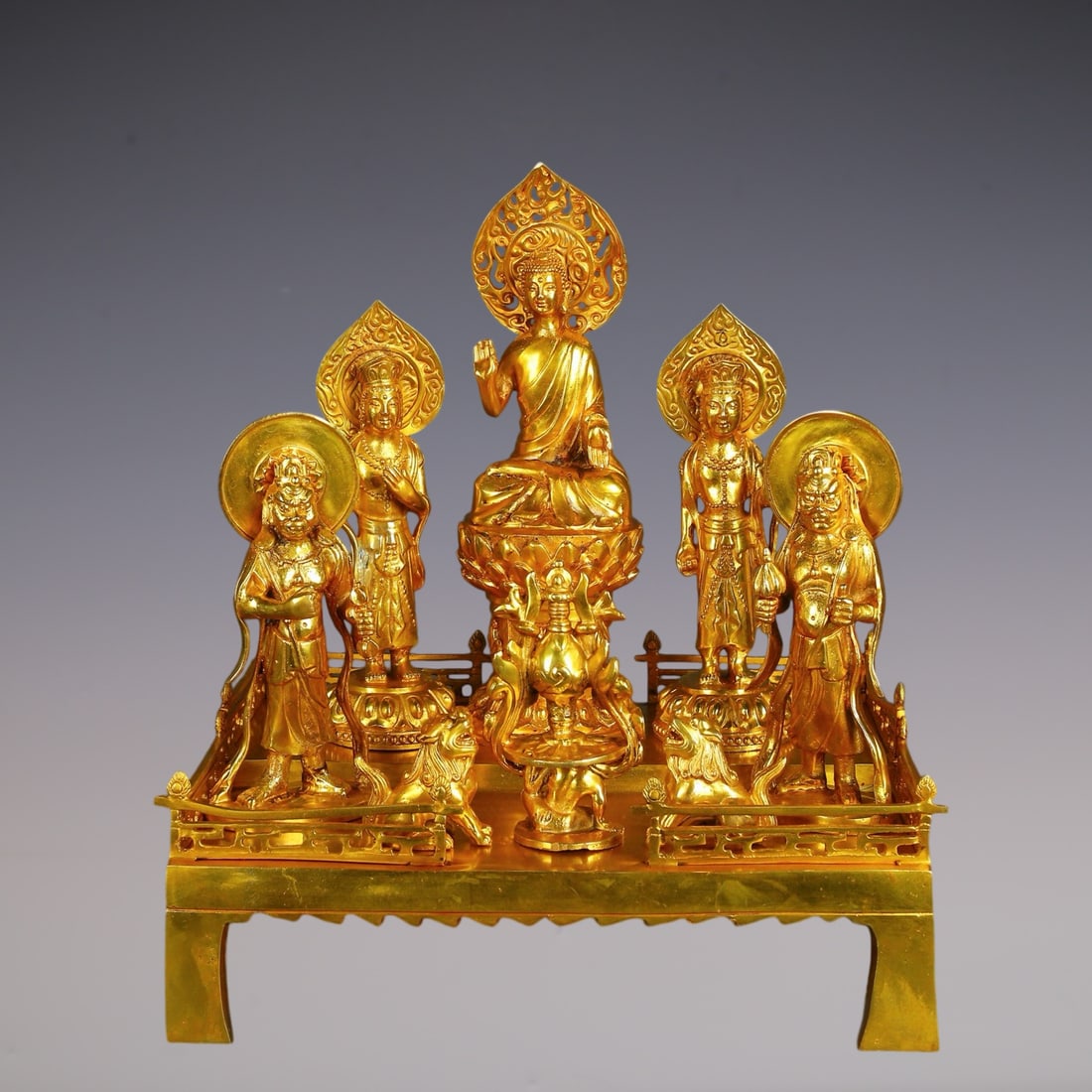 An Exquisite Gilt Bronze Buddha Statue: An Exquisite Gilt Bronze Buddha Statue N.Wei , China Size:38cmx42cm Weight:12250g (The Dimensions Of All Batches Are Manually Measured.If You Need More Detailed Information, Please Contact Our