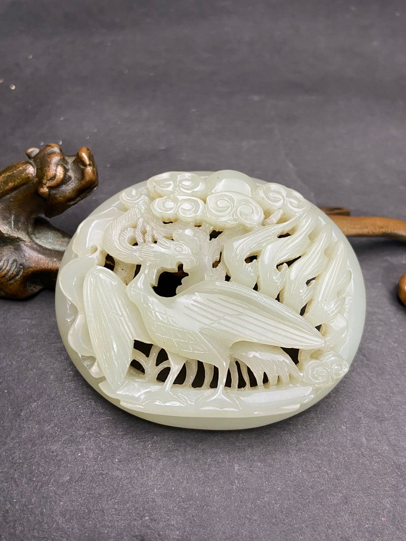 An Exquisite White Jade Phoenix Pattern Ornament: An Exquisite White Jade Phoenix Pattern Ornament Liao Dynasty, China Size:6.68cmx5.57cmx1.65cm Weight:60g (The Dimensions Of All Batches Are Manually Measured.If You Need More Detailed Information,