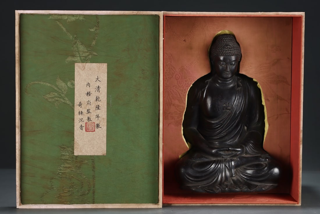 An Exquisite Eaglewood Statue of Sakyamuni: An Exquisite Eaglewood Statue of Sakyamuni Qing Dynasty, China Size:24cmx19.5cmx33.5cm (The Dimensions Of All Batches Are Manually Measured.If You Need More Detailed Information, Please Contact Our