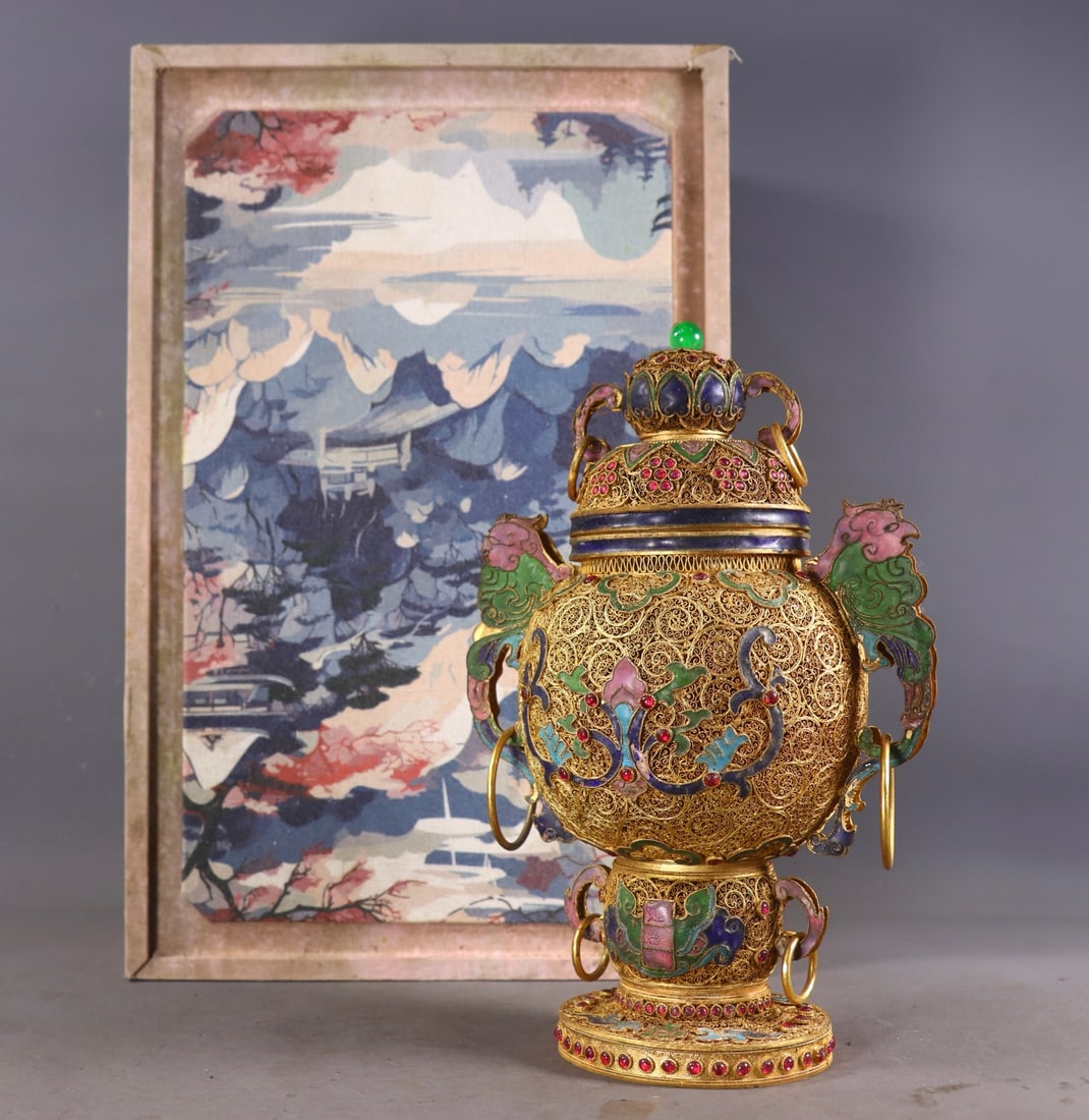 An Exquisite Gilt Bronze Inlaid Gems Lotus Pattern Double-Ears Censer: An Exquisite Gilt Bronze Inlaid Gems Lotus Pattern Double-Ears Censer Qing Dynasty, China Qianlong Four-character Mark Size:26cmx16cmx10cm Weight:717g (The Dimensions Of All Batches Are Manually