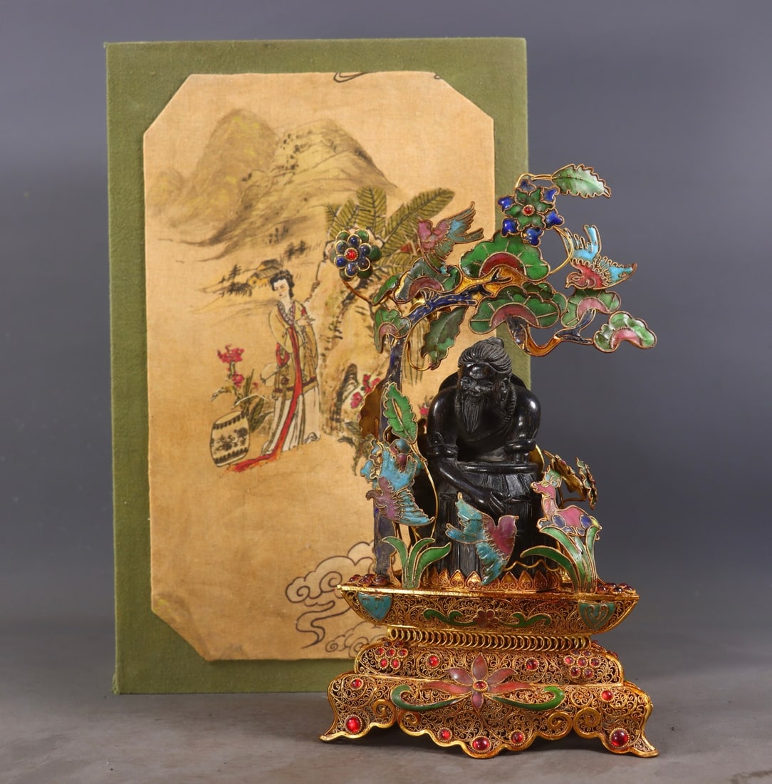 An Exquisite Gilt Bronze Inlaid Gems Figure Ornament: An Exquisite Gilt Bronze Inlaid Gems Figure Ornament Qing Dynasty, China Qianlong Four-character Mark Size:23cmx13.5cmx7.5cm Weight:517g (The Dimensions Of All Batches Are Manually Measured.If You
