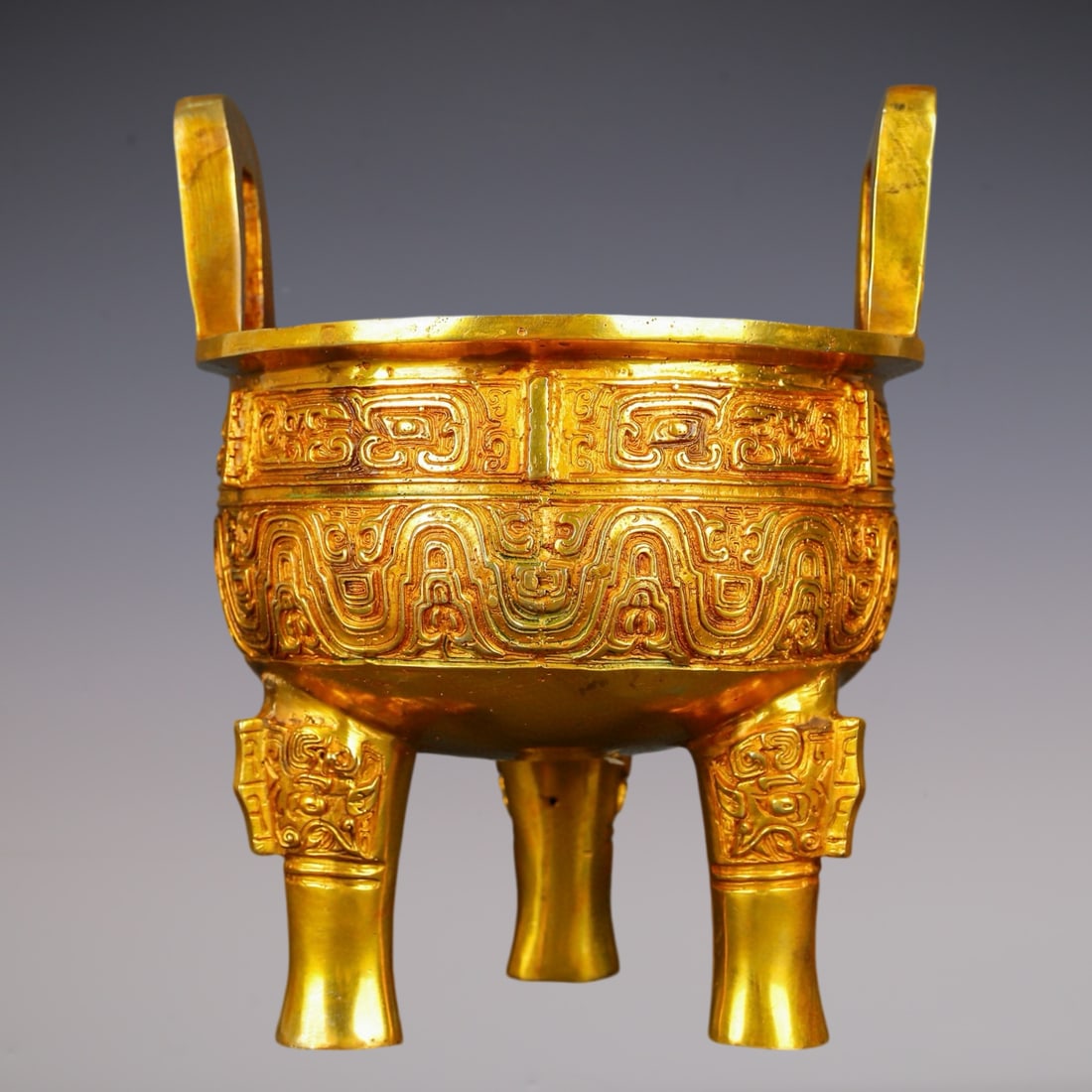 An Exquisite Gilt Bronze Beast-Face Pattern With Inscription Double-Ears Censer: An Exquisite Gilt Bronze Beast-Face Pattern With Inscription Double-Ears Censer Han Dynasty, China Size:20cmx24cm Weight:3200g (The Dimensions Of All Batches Are Manually Measured.If You Need More
