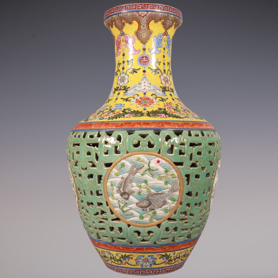 An Exquisite Famille-Rose Fish and Lotus Pattern Lotus Pattern Vase: An Exquisite Famille-Rose Fish and Lotus Pattern Lotus Pattern Vase Qing Dynasty, China Qianlong Six-character Mark Size:42.3cmx26cm (The Dimensions Of All Batches Are Manually Measured.If You Need