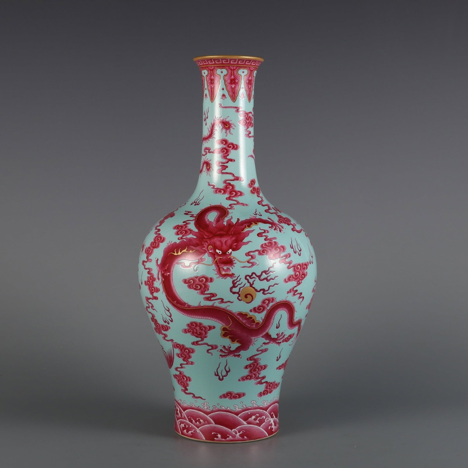An Exquisite Ruby Red-Glazed Green Ground Dragon and Phoenix Pattern Seawater Pattern Vase: An Exquisite Ruby Red-Glazed Green Ground Dragon and Phoenix Pattern Seawater Pattern Vase Qing Dynasty, China Yongzheng Six-character Mark Size:34.2cmx16cm (The Dimensions Of All Batches Are