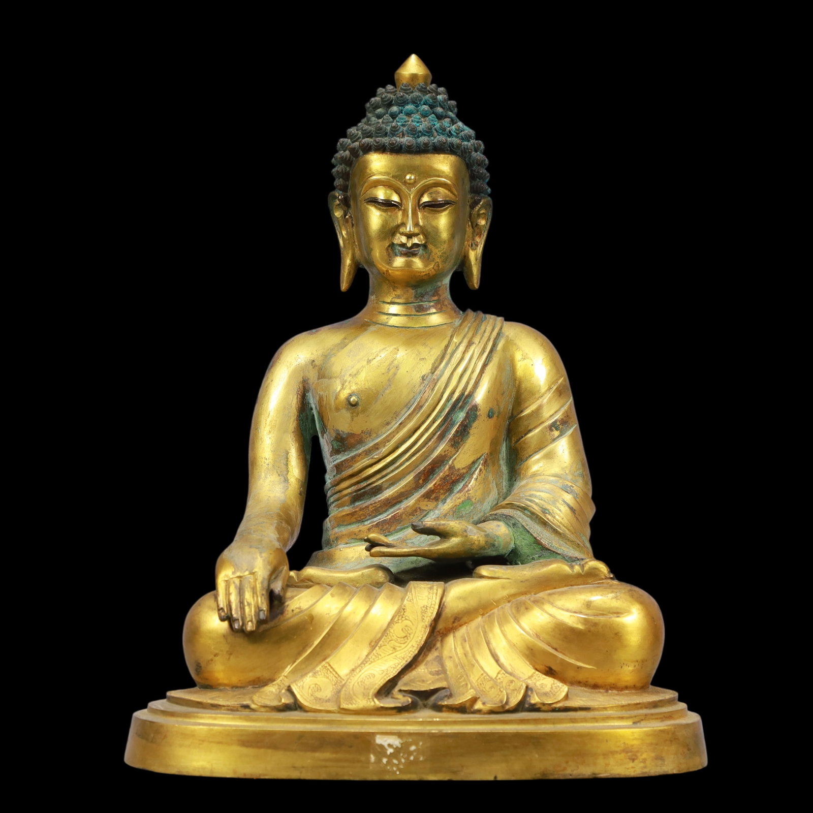 A Exquisite Gilt Bronze Statue of Sakyamuni: A Exquisite Gilt Bronze Statue of Sakyamuni Ming Dynasty, China Yongle Six-character Mark Size:22.5cmx17cmx29cm Weight:5600g (The Dimensions Of All Batches Are Manually Measured.If You Need More