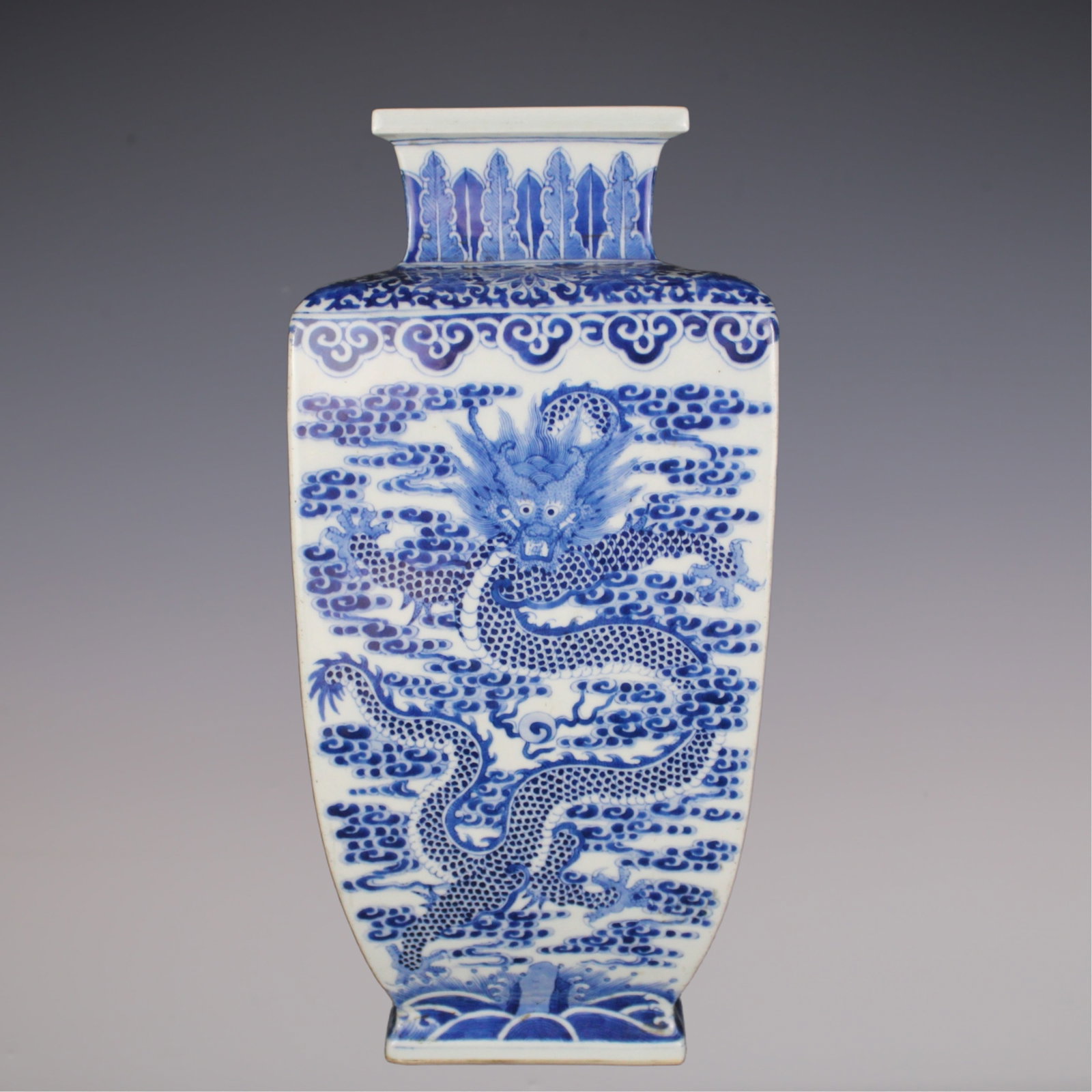 An Exquisite Blue and White Dragon Pattern Seawater Pattern Vase: An Exquisite Blue and White Dragon Pattern Seawater Pattern Vase Qing Dynasty, China Qianlong Six-character Mark Size:38cmx12.5cm (The Dimensions Of All Batches Are Manually Measured.If You Need More