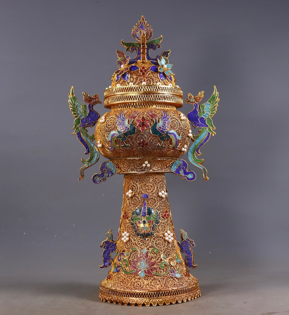 An Exquisite Gilt Bronze Inlaid Gems Beast-Face Pattern Flower and Bird Pattern Double-Ears Censer: An Exquisite Gilt Bronze Inlaid Gems Beast-Face Pattern Flower and Bird Pattern Double-Ears Censer Qing Dynasty, China Qianlong Four-character Mark Size:39cmx20cmx13.5cm Weight:1090g (The Dimensions