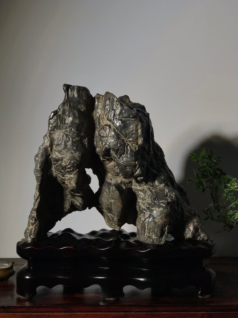 An Exquisite Taihu Stone Ornament: An Exquisite Taihu Stone Ornament Qing Dynasty, China Size:39cmx37cmx14cm (The Dimensions Of All Batches Are Manually Measured.If You Need More Detailed Information, Please Contact Our Customer