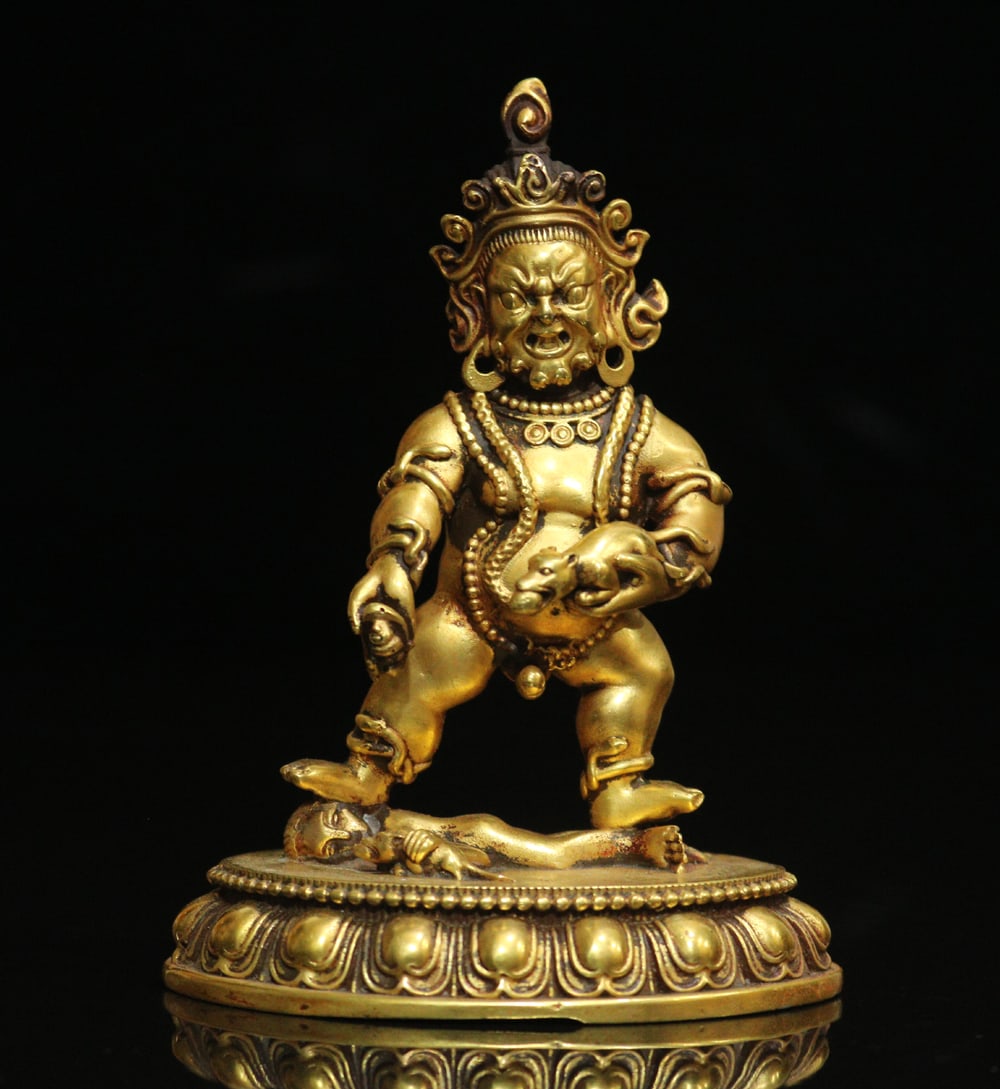 An Exquisite Gilt Bronze Statue of Mammon Ornament: An Exquisite Gilt Bronze Statue of Mammon Ornament Ming Dynasty, China Size:10cmx7.5cm Weight:346g (The Dimensions Of All Batches Are Manually Measured.If You Need More Detailed Information, Please
