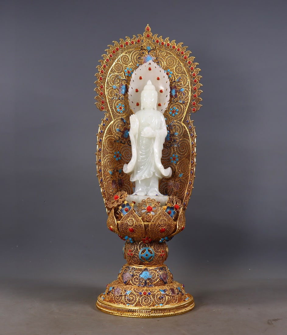 An Exquisite Gilt Bronze Inlaid White Jade Buddha Statue: An Exquisite Gilt Bronze Inlaid White Jade Buddha Statue Qing Dynasty, China Qianlong Four-character Mark Size:46cmx17.5cmx15cm Weight:2186g (The Dimensions Of All Batches Are Manually Measured.If