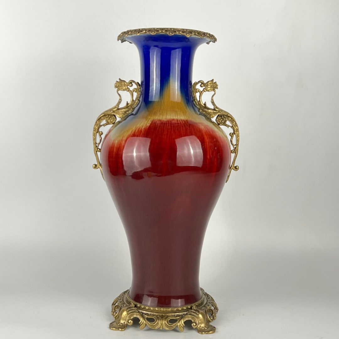 An Exquisite Flambe Glazed Inlaid Bronze Double-Ears Vase: An Exquisite Flambe Glazed Inlaid Bronze Double-Ears Vase Qing Dynasty, China Qianlong Six-character Mark Size:49cmx26cm (The Dimensions Of All Batches Are Manually Measured.If You Need More Detailed 