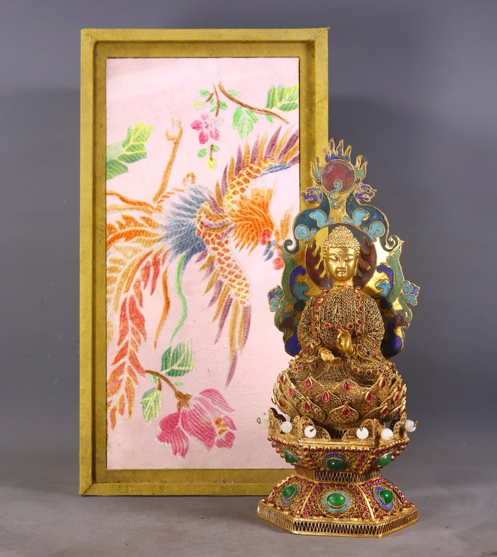 An Exquisite Gilt Bronze Inlaid Gems Buddha Statue: An Exquisite Gilt Bronze Inlaid Gems Buddha Statue Qing Dynasty, China Qianlong Four-character Mark Size:28.5cmx11.5cm Weight:734g (The Dimensions Of All Batches Are Manually Measured.If You Need
