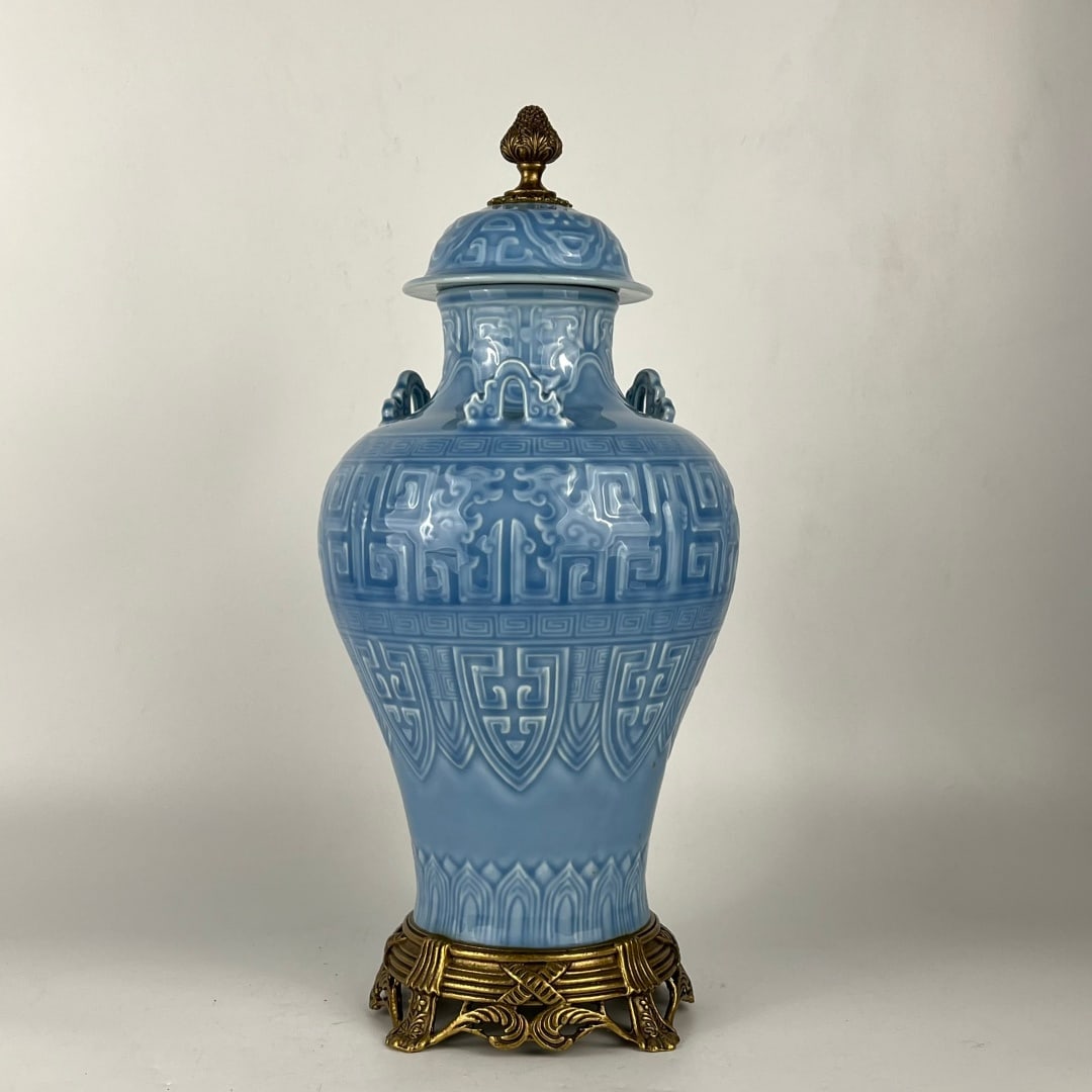 An Exquisite Sky Blue Glazed Inlaid Bronze Dragon Pattern Double-Ears Vase: An Exquisite Sky Blue Glazed Inlaid Bronze Dragon Pattern Double-Ears Vase Qing Dynasty, China Qianlong Six-character Mark Size:48.5cmx20cm (The Dimensions Of All Batches Are Manually Measured.If You