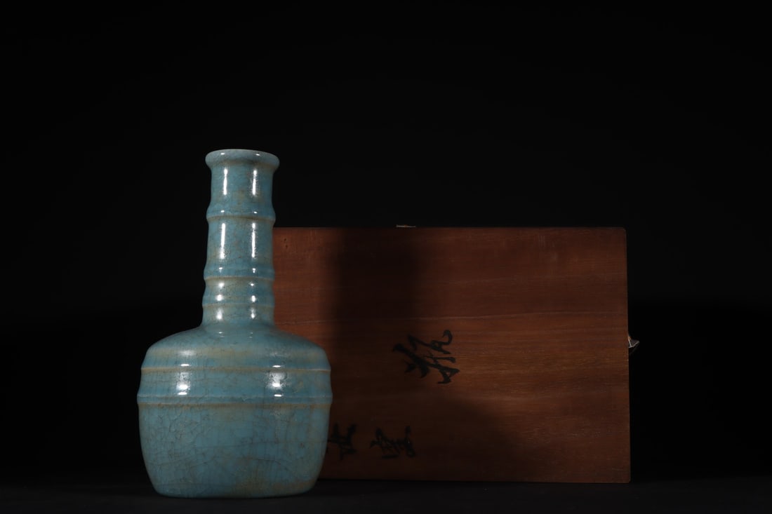 An Exquisite Ru yao Sky Blue Glazed Vase: An Exquisite Ru yao Sky Blue Glazed Vase Song Dynasty, China Size:21.8cmx12.5cm (The Dimensions Of All Batches Are Manually Measured.If You Need More Detailed Information, Please Contact Our Customer 