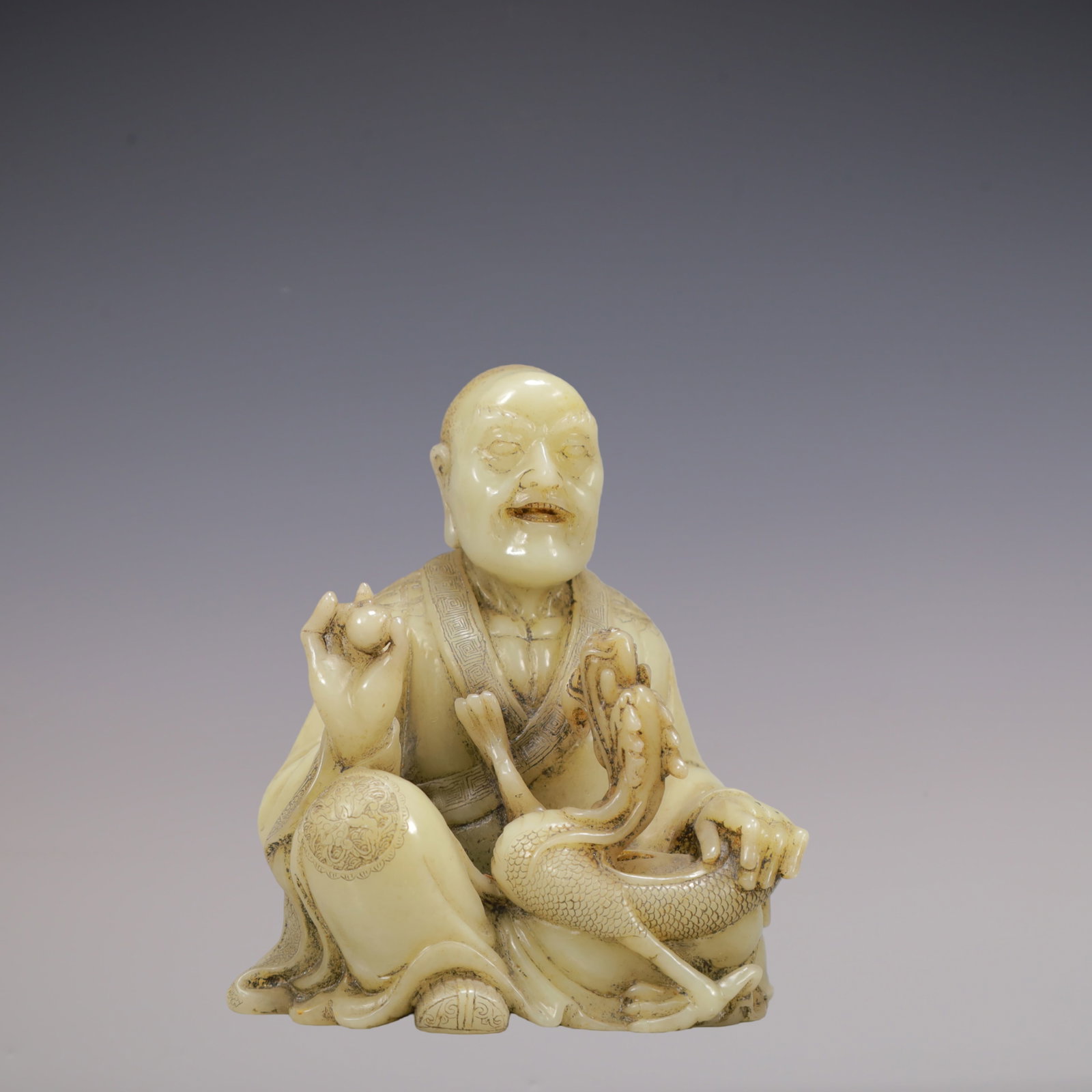 A Exquisite Shoushan Stone Statue of Arhat Ornament: A Exquisite Shoushan Stone Statue of Arhat Ornament Qing Dynasty, China Size:8.5cmx6.2cmx11.3cm Weight:550g (The Dimensions Of All Batches Are Manually Measured.If You Need More Detailed Information,