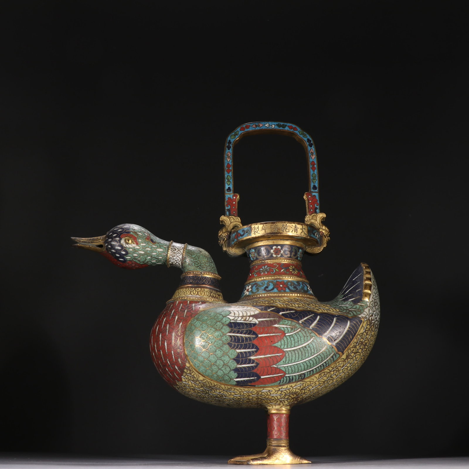 One gilt copper cloisonne duck-shaped handle: Gilt copper cloisonne duck-shaped handlebar SIZE: H:30.5cm W:21.8cm W:1915.7g (The Dimensions Of All Batches Are Manually Measured.If You Need More Detailed Information, Please Contact Our Customer