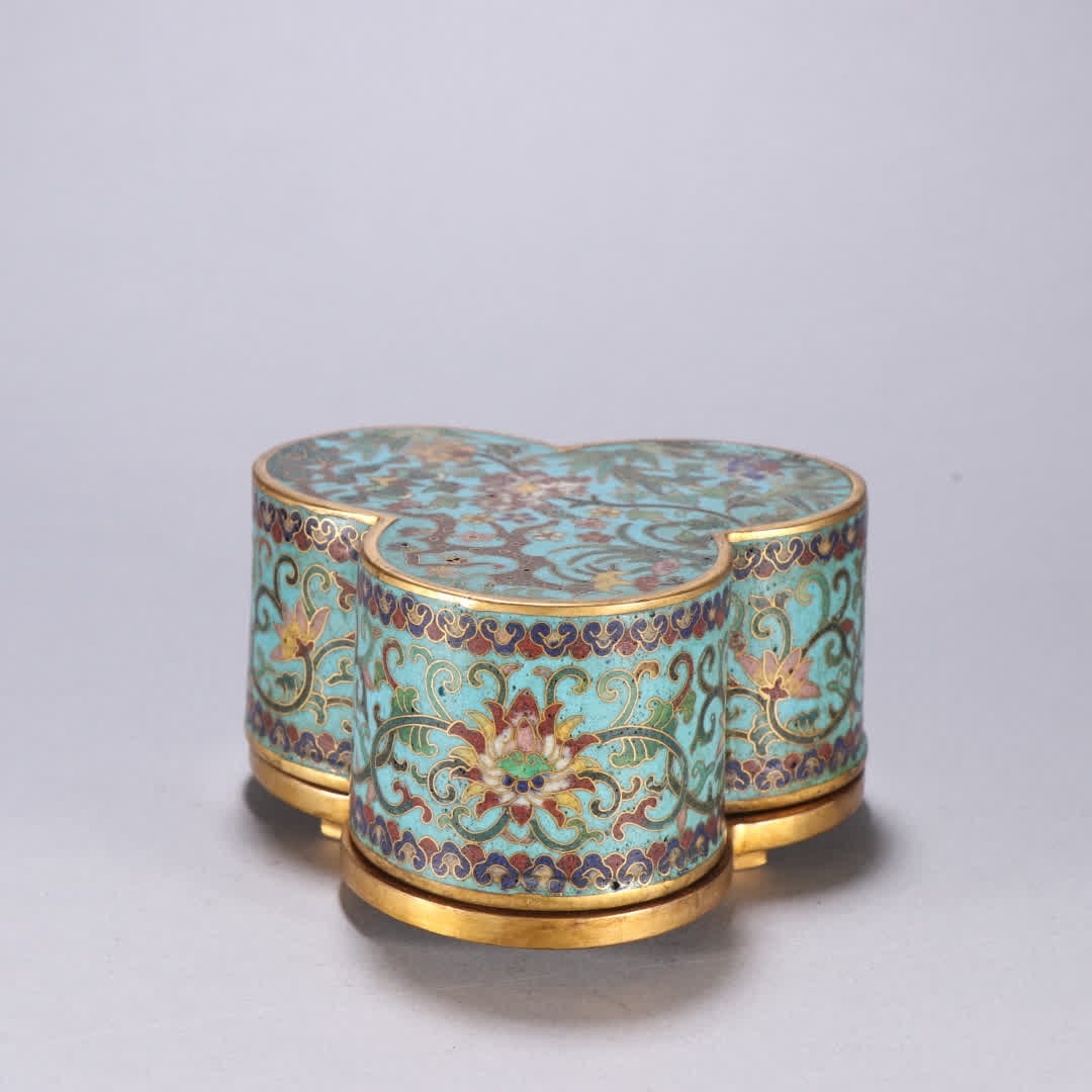 A Qing Dynasty bronze gilt cloisonne triple-lid box of lotus entwined lotus: Qing Dynasty bronze gilt cloisonne triple-lidded box with entwined lotus branches SIZE: H:5.4cm W:10.8cm W:740.2g (The Dimensions Of All Batches Are Manually Measured.If You Need More Detailed