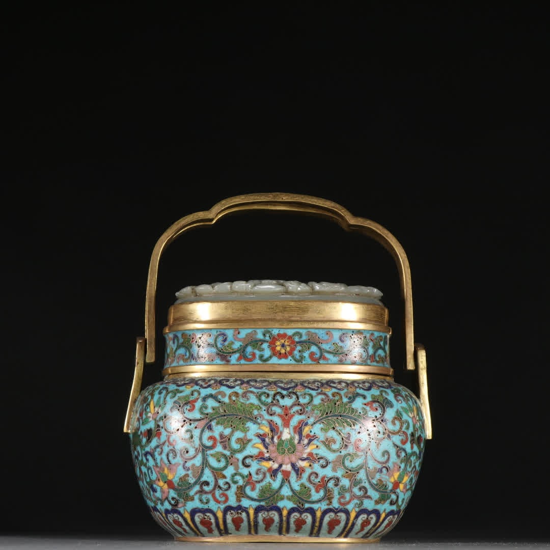 A Qing Dynasty copper gilt cloisonne lotus pattern hand warmer (1 of 9)