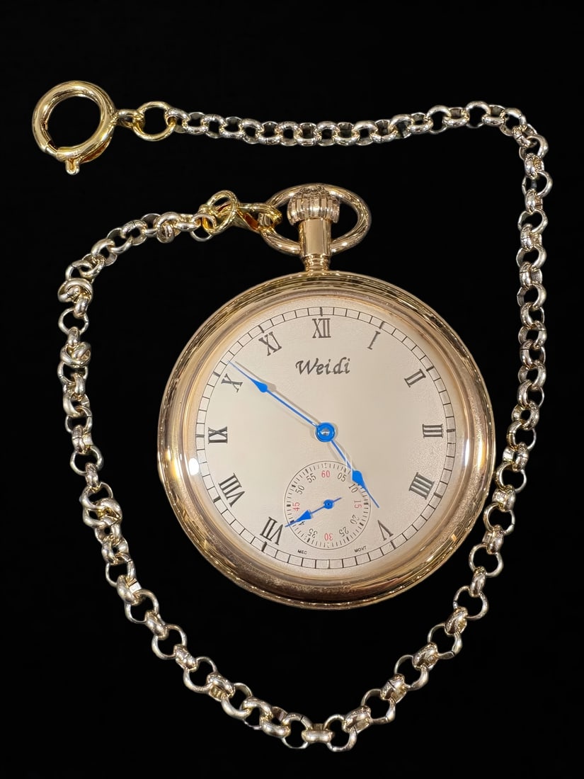 A Vetti open-face pocket watch: Weidi opened pocket watch SIZE: D: 5.1cm Weight: 89g (The Dimensions Of All Batches Are Manually Measured.If You Need More Detailed Information, Please Contact Our Customer Service Before Bidding.)