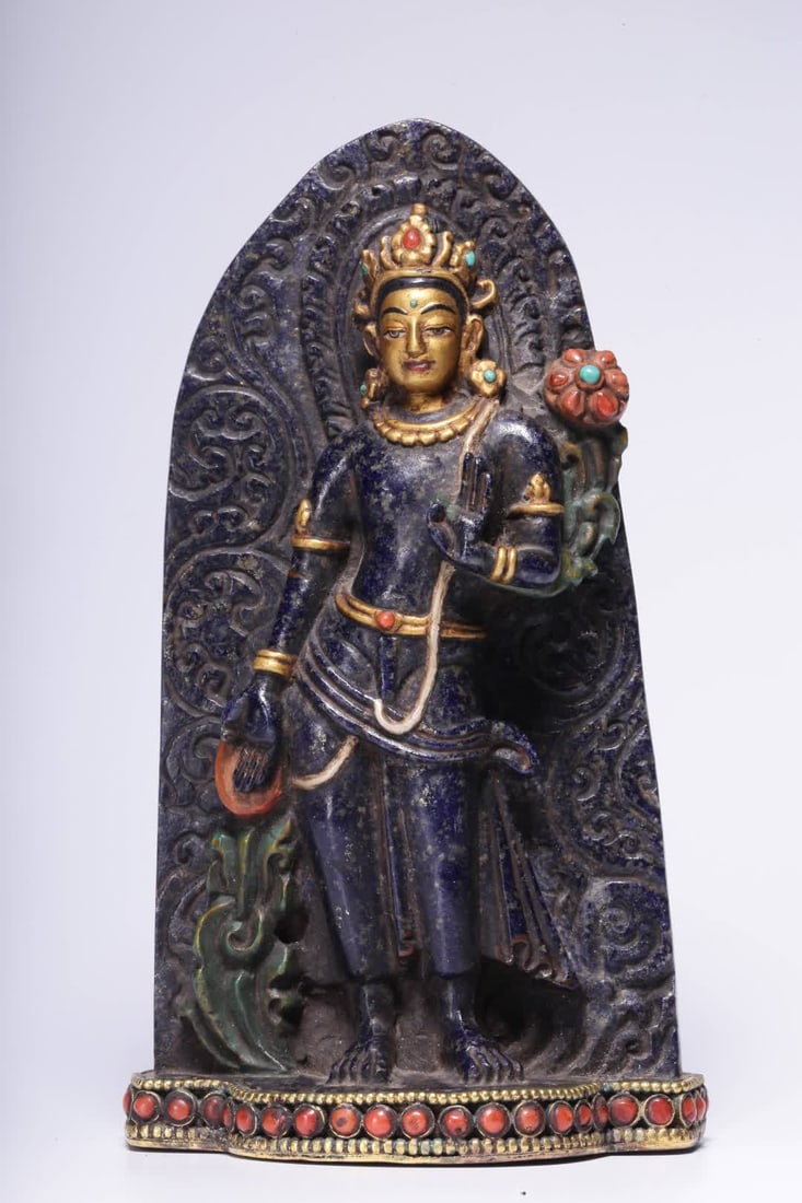 A Qing Dynasty lapis lazuli standing statue of Guanyin holding a lotus with gold painting (1 of 10)