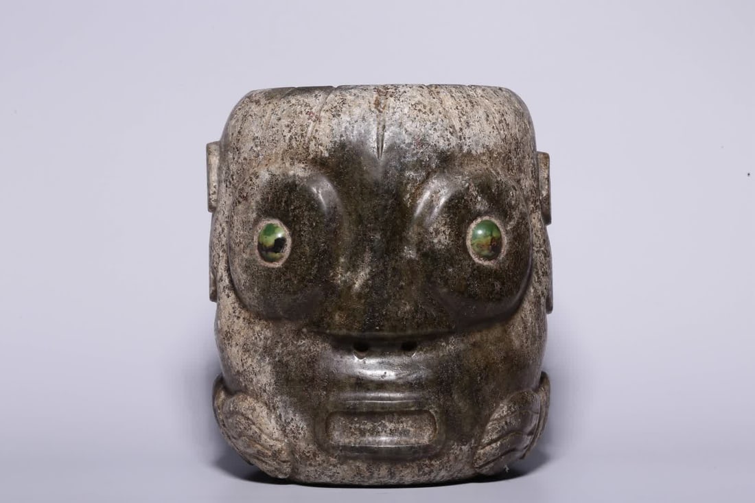 A piece from Qijia Culture, ancient jade inlaid with turquoise and beast human-faced jade cong: Qijia Culture: Ancient jade inlaid with turquoise and stone beasts, human-faced jade cong SIZE: H: 18cm, Diameter 14.7cm, W: 4413g (The Dimensions Of All Batches Are Manually Measured.If You Need