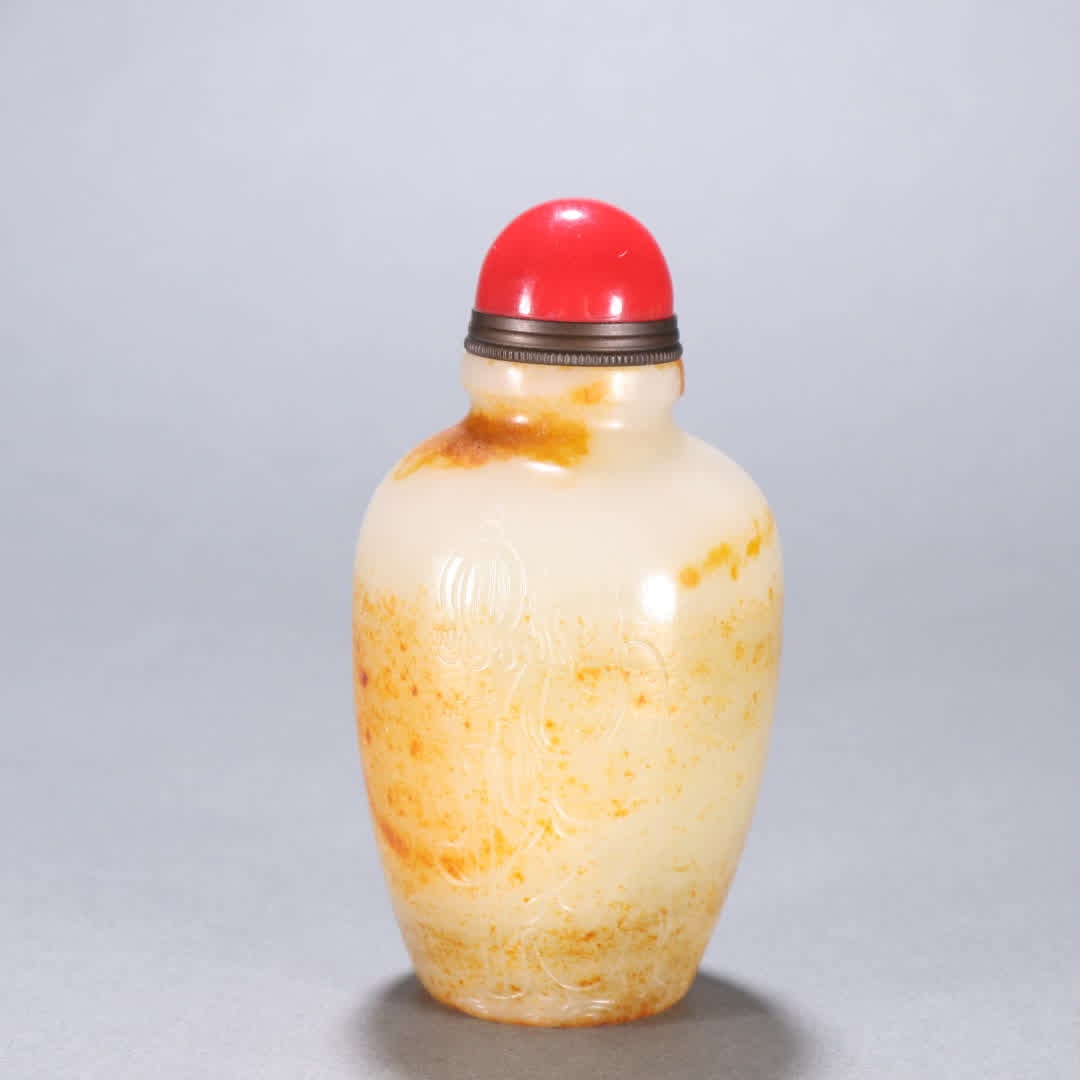 A Qing Dynasty Hetian jade seed material carved figure snuff bottle: Qing Dynasty Hetian jade seed material carved human snuff bottle SIZE: H:9.8cm W:5.1cm W:248g (The Dimensions Of All Batches Are Manually Measured.If You Need More Detailed Information, Please Contact