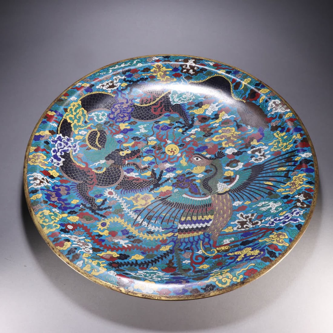 A Qing Dynasty bronze-bodied cloisonne plate with dragon and phoenix patterns (1 of 9)