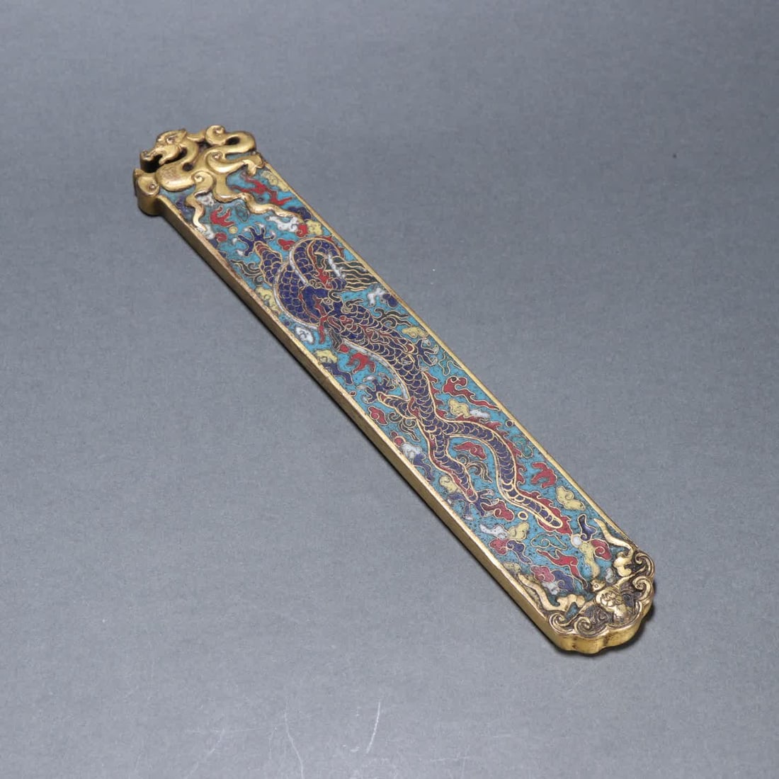 A Qing Dynasty bronze gilt cloisonne dragon pattern weight: Qing Dynasty Gilt cloisonne Dragon Pattern Weight SIZE: L:21cm W:3.7cm W:395.8g (The Dimensions Of All Batches Are Manually Measured.If You Need More Detailed Information, Please Contact Our Customer