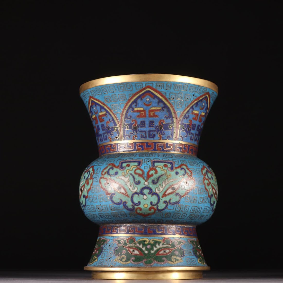 A Qing Dynasty bronze gilt cloisonne zun with beast-face motif: Qing Dynasty bronze gilt cloisonne zun with beast-face motif SIZE: H:15cm W:11cm W:850g (The Dimensions Of All Batches Are Manually Measured.If You Need More Detailed Information, Please Contact Our