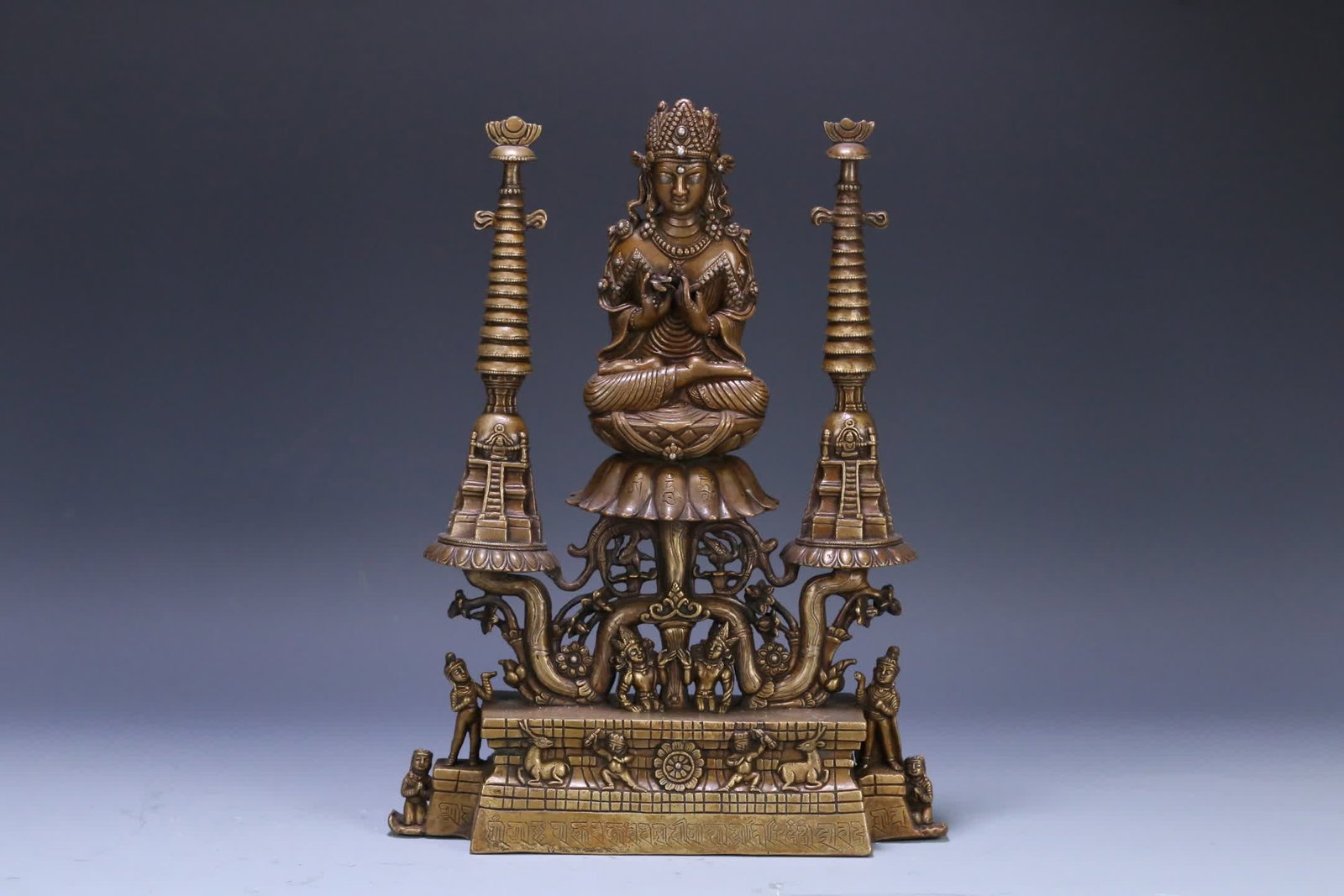 A Batorla dynasty gold-bronze inlaid silver statue of the Buddha, the king of the world (1 of 9)