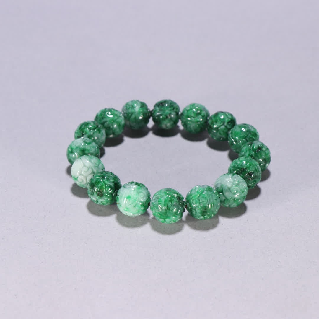A Qing Dynasty jadeite patterned bracelet: Qing Dynasty jadeite patterned bracelet SIZE: Bead diameter 1.2cm W: 46.8g (The Dimensions Of All Batches Are Manually Measured.If You Need More Detailed Information, Please Contact Our Customer Servi